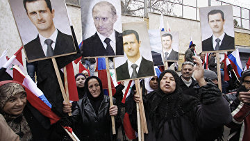 Портреты Владимира Путина и Башара Асада на акции в Дамаске