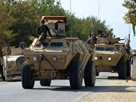 Афганские силы безопасности во время продолжающихся боевых действий с боевиками «Талибана» в Кундузе