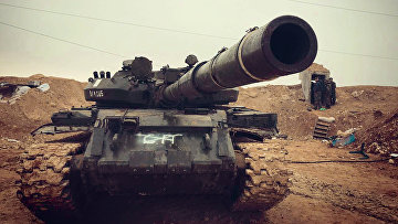 Бойцы сирийской армии во время наступления на город Хальфая на севере сирийской провинции Хама