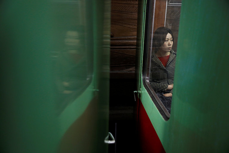 Пассажир в вагоне поезда