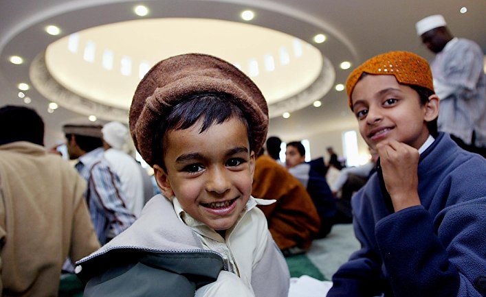 Children during a prayer in a mosque in London